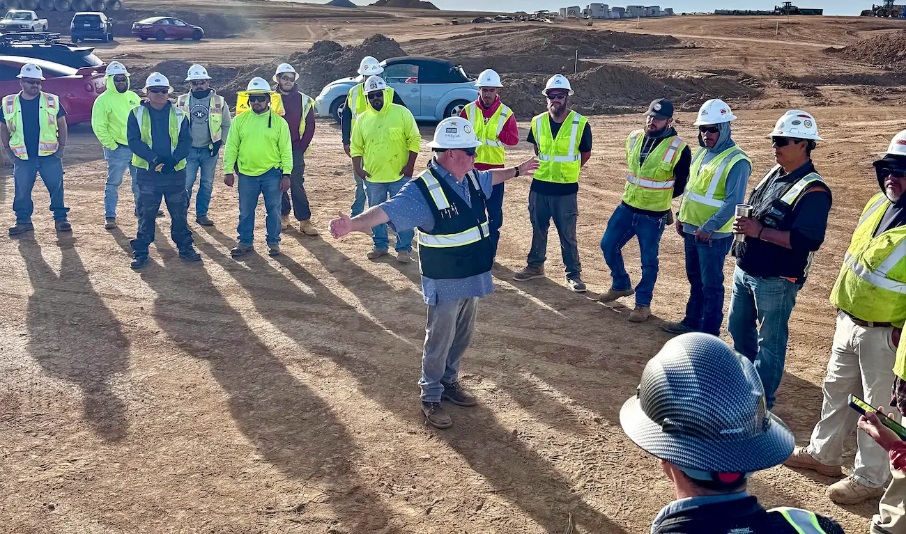 Alpine crew in a morning safety meeting