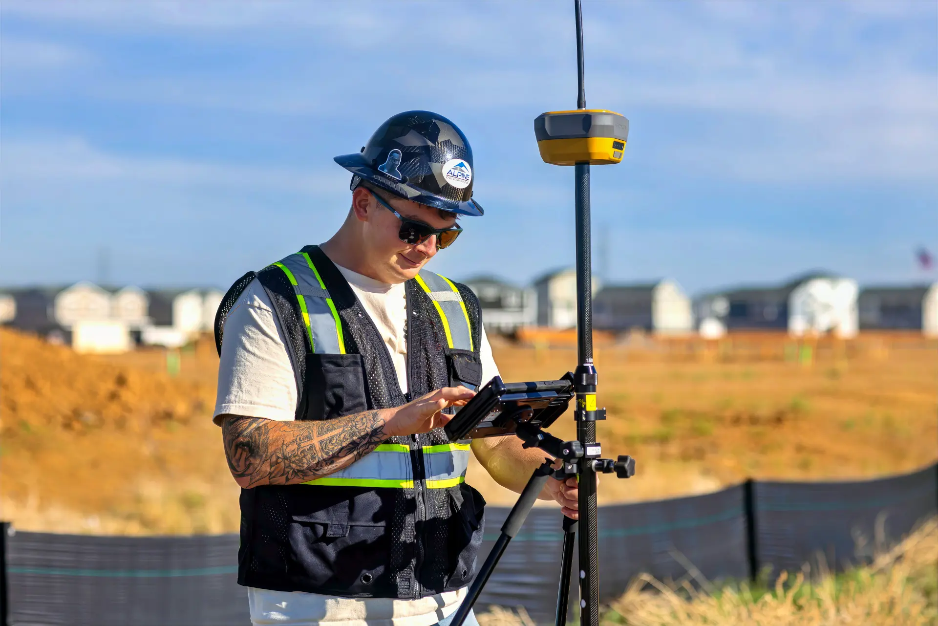 An Alpine surveyor with a Topcon rover